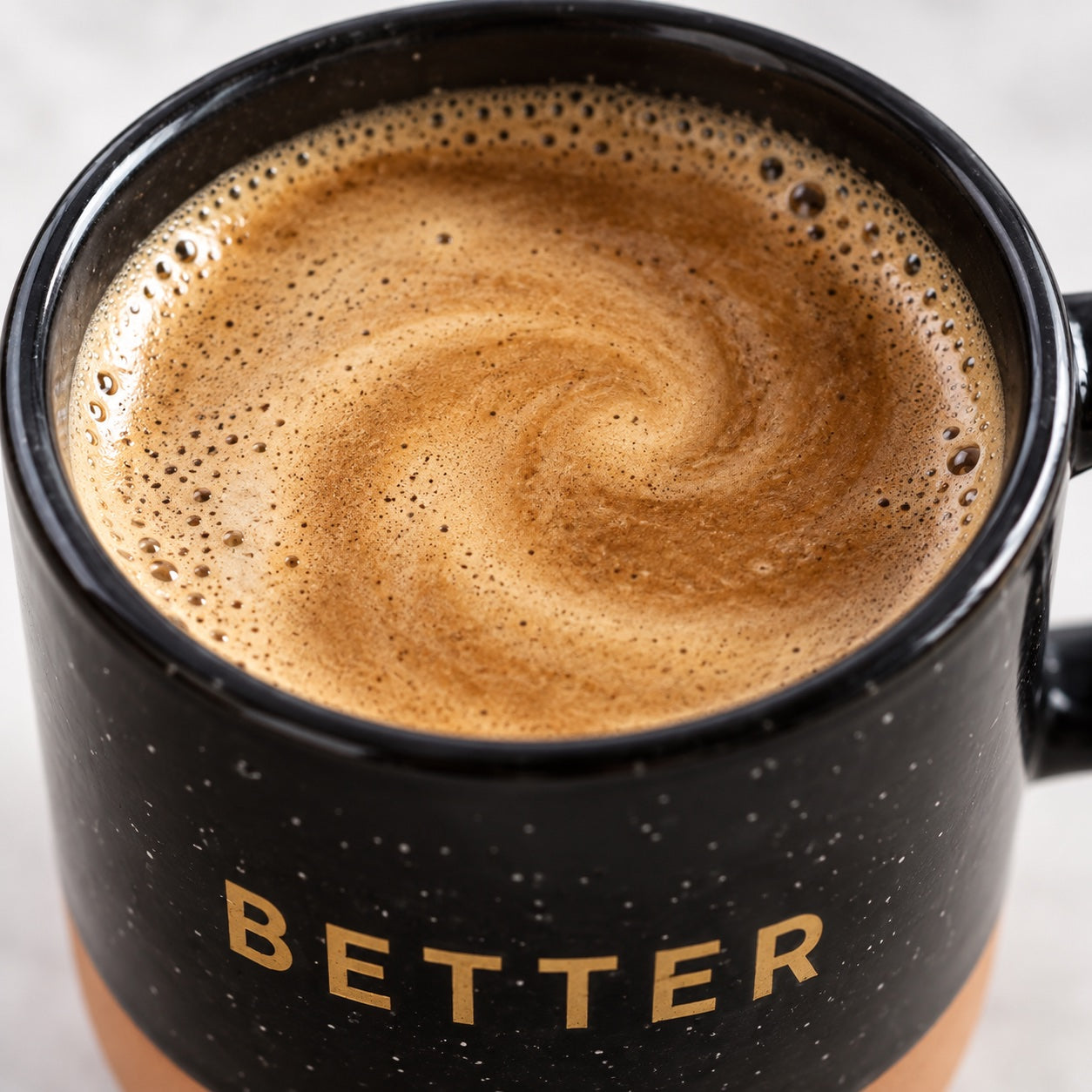 A freshly stirred cup of coffee
